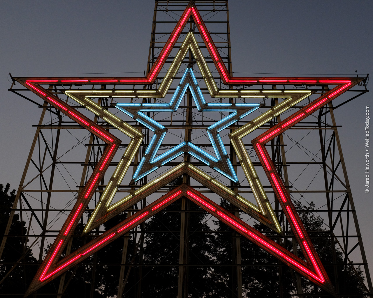 Mill Mountain's neon star shines out over Roanoke at sunset on Friday, May 26, 2017.