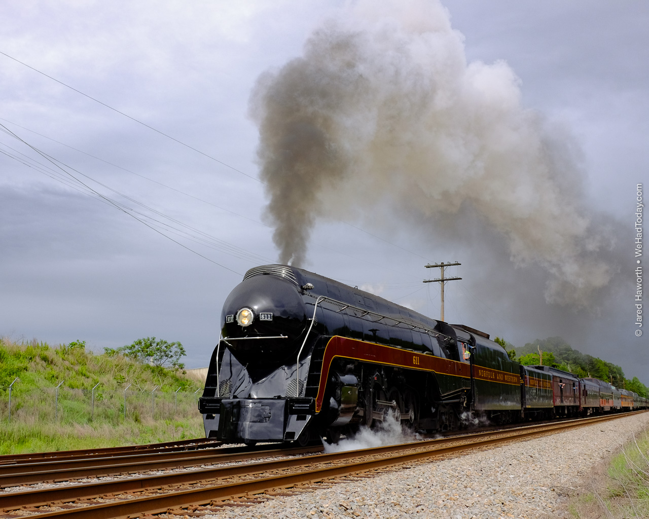 Leaving Petersburg Virginia and some rainy weather behind, the N&W 611 comes up to speed enroute to Lynchburg.