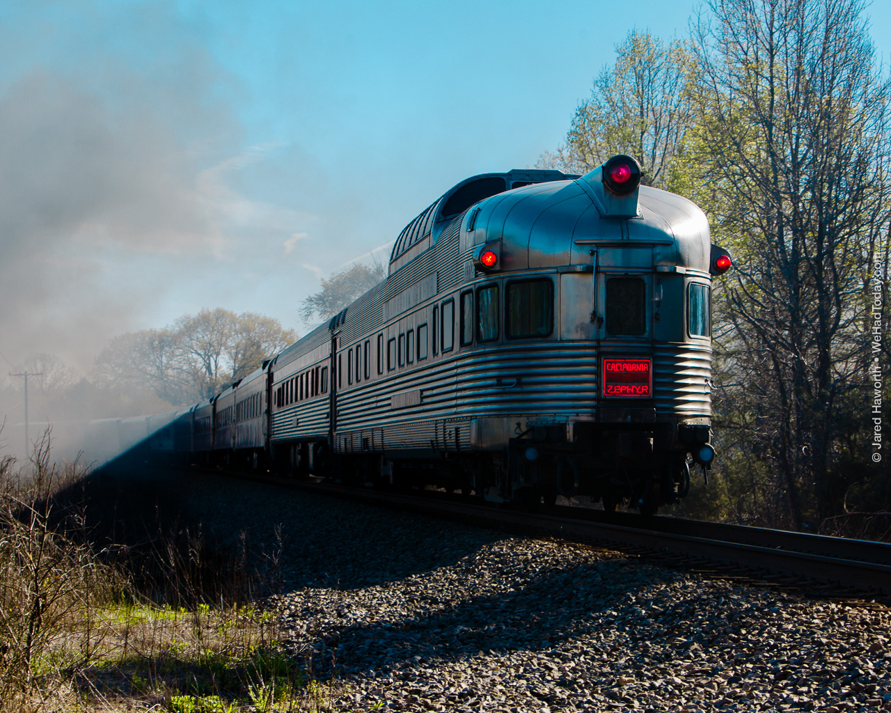 The California Zephyr observation car trails the Class J 611 excursion run on April 8, 2017