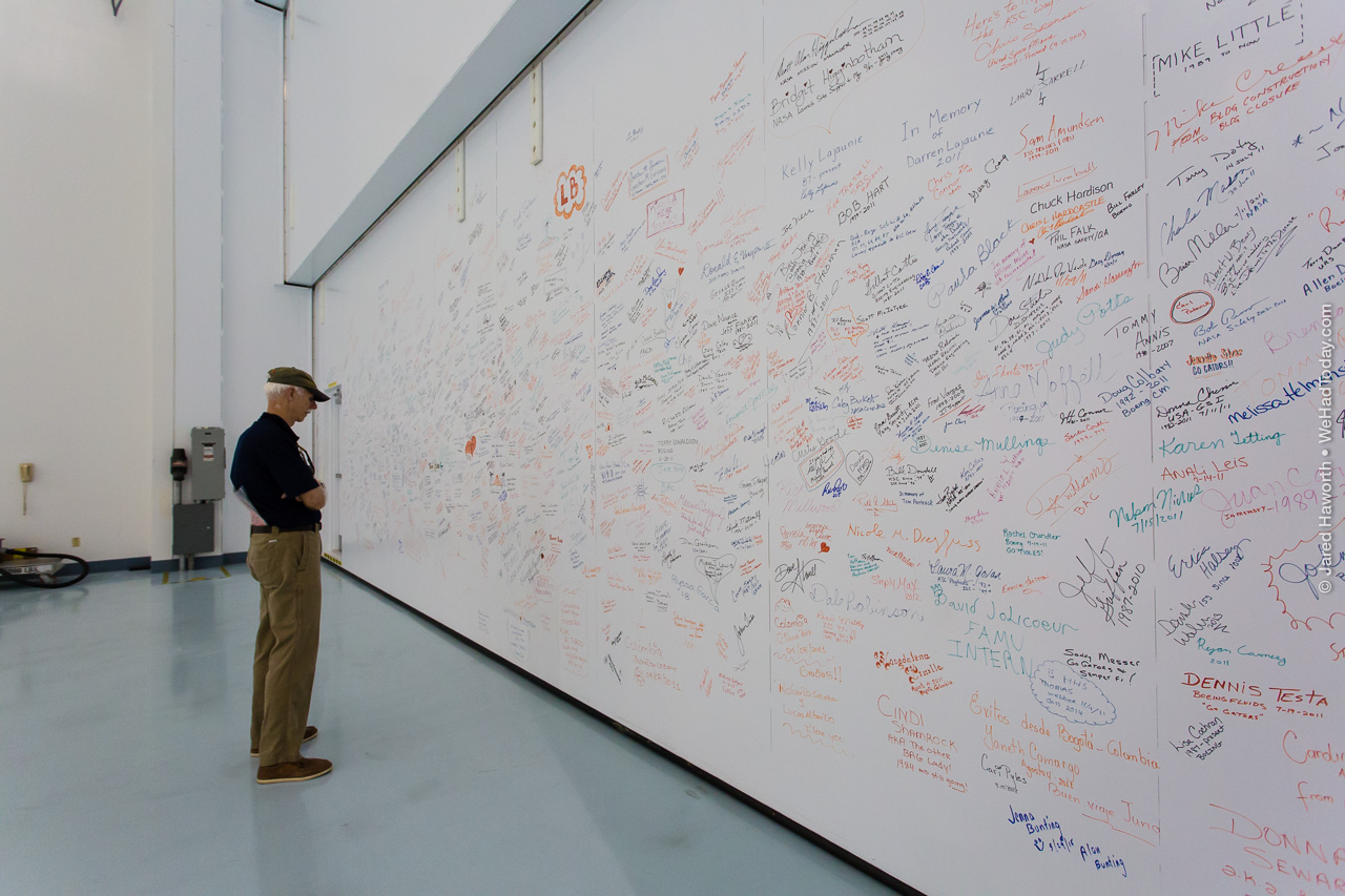 Employees and contractors who worked in the Space Station Processing Facility signed this wall following the successful assembly on orbit of the International Space Station