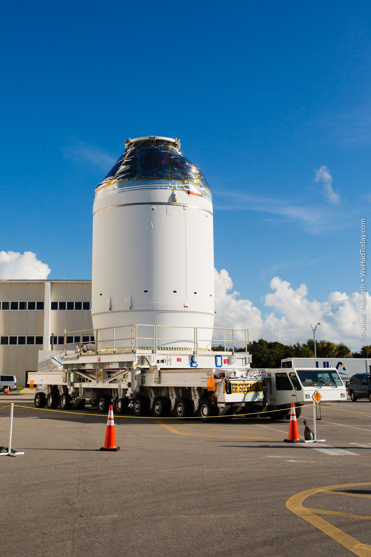 The Orion spacecraft, atop a 'dummy' service module, is prepared to move to the Payload Hazardous Servicing Facility for fueling.