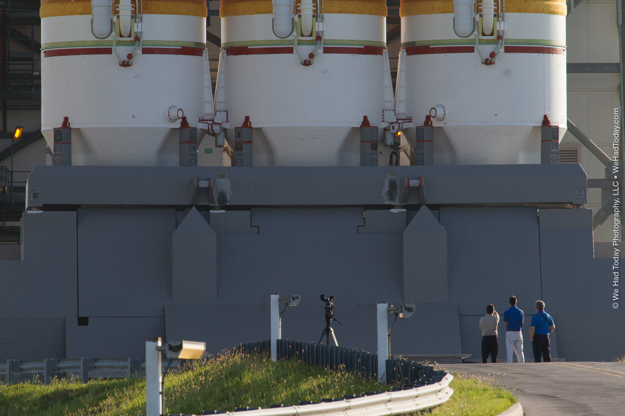 Employees appear tiny at the base of the 24+ story rocket.  Photo credit: Dawn Haworth