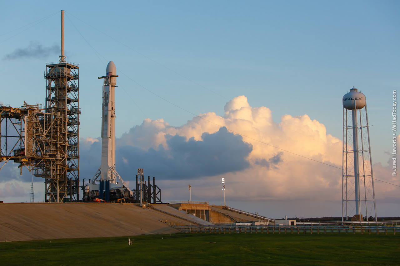 The Falcon 9 rocket carrying EchoStar 105 / SES-11 stands ready to launch at LC-39A, less than 12 hours from liftoff.