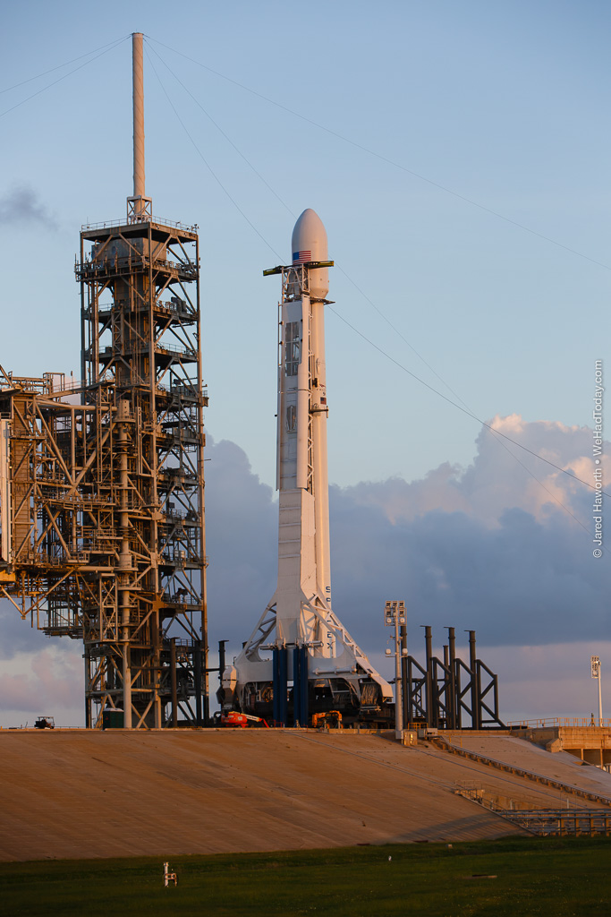 The Falcon 9 rocket carrying EchoStar 105 / SES-11 stands ready to launch at LC-39A, less than 12 hours from liftoff.